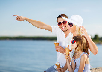 Image showing happy family eating ice cream