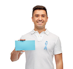 Image showing man with prostate cancer awareness ribbon and card