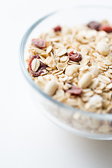 Image showing close up of bowl with granola or muesli on table