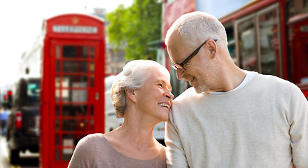 Image showing happy senior couple on london street in england