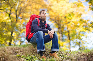 Image showing man with backpack hiking