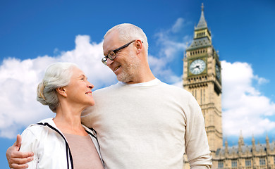 Image showing happy senior couple over big ben tower in london