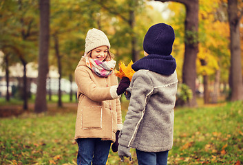 Image showing smiling children in autumn park