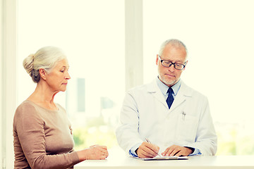 Image showing senior woman and doctor meeting