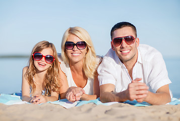 Image showing happy family on the beach