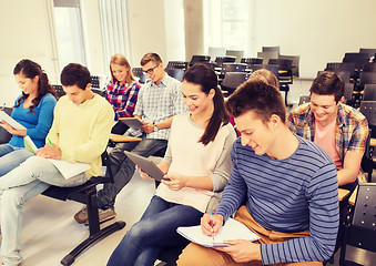 Image showing group of smiling students with tablet pc