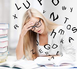 Image showing student with books and notes