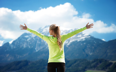 Image showing happy woman in sportswear enjoying sun and freedom