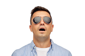 Image showing face of scared man in shirt and sunglasses