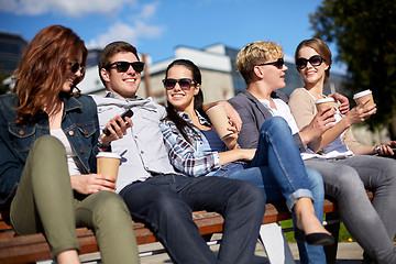 Image showing group of students or teenagers drinking coffee