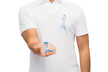 Image showing hand with blue prostate cancer awareness ribbon