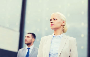 Image showing close up of serious businessmen