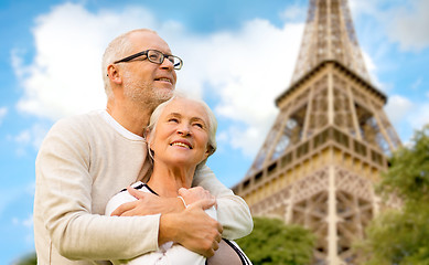 Image showing happy senior couple over paris eiffel tower