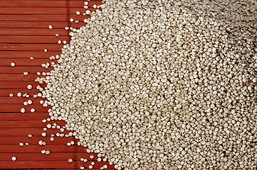 Image showing Quinoa and a wooden background.