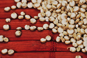 Image showing Quinoa and a wooden background.