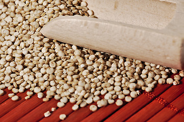 Image showing Quinoa and a wooden background.