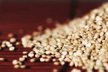 Image showing Quinoa and a wooden background.