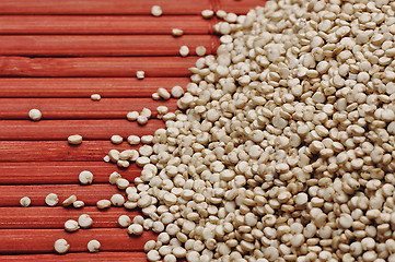 Image showing Quinoa and a wooden background.
