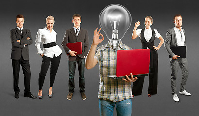 Image showing Business Team With Lamp Head