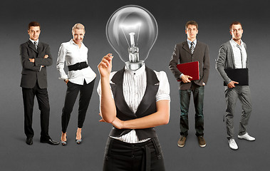 Image showing Business Team With Lamp Head