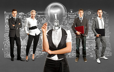 Image showing Business Team With Lamp Head