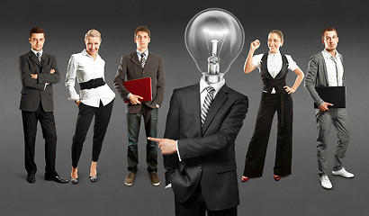 Image showing Business Team With Lamp Head