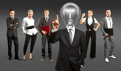 Image showing Business Team With Lamp Head