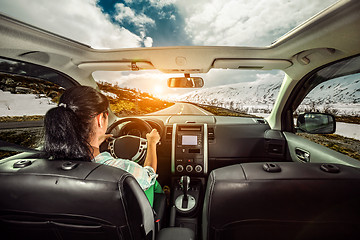 Image showing Woman behind the wheel of a car.