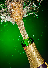 Image showing Bottle of champagne with splash