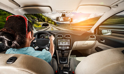 Image showing Woman behind the wheel of a car.