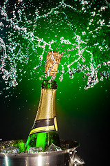 Image showing Bottle of champagne with splash