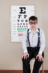 Image showing person wearing spectacles in an office at the doctor