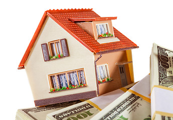 Image showing house on packs of banknotes