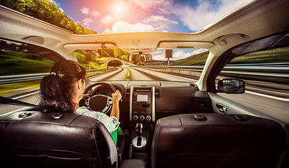 Image showing Woman behind the wheel of a car.