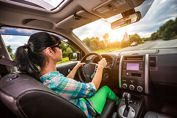 Image showing Woman behind the wheel of a car.