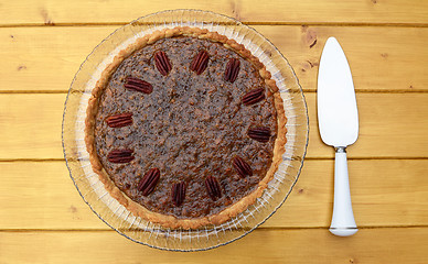 Image showing Pecan pie with pie server