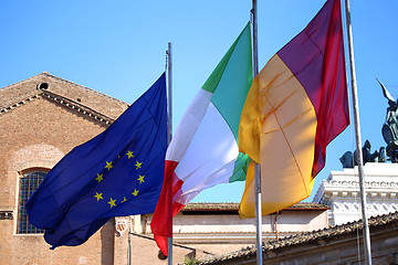 Image showing Flags of Italy, European Union and Roma city waving in Rome, Ita