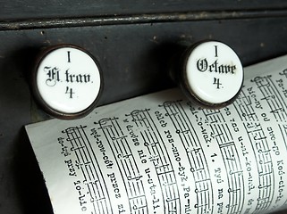 Image showing Music sheet  on the top of a church organ