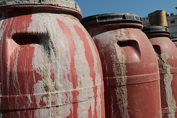 Image showing Old empty plastic drums_5741