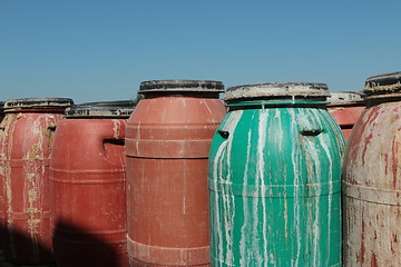 Image showing Old empty plastic drums_5743