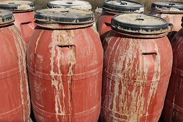 Image showing Old empty plastic drums_5745