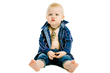 Image showing Little dissatisfied boy in a plaid shirt