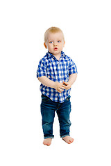 Image showing little boy in a plaid shirt and jeans