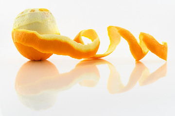 Image showing Orange with peeled skin