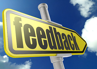 Image showing Yellow road sign with feedback word under blue sky