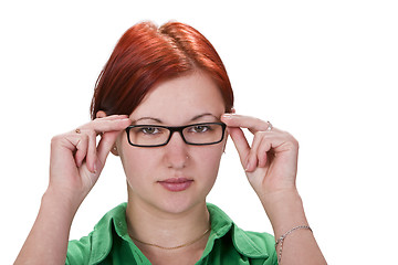 Image showing Redheaded girl with glasses