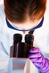 Image showing Life science researcher microscoping in the laboratory.