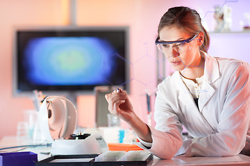 Image showing Life science researcher working in laboratory.