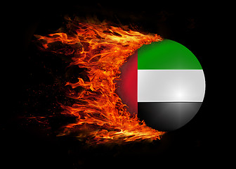 Image showing Flag with a trail of fire - UAE