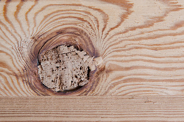 Image showing Knotted wooden board close up